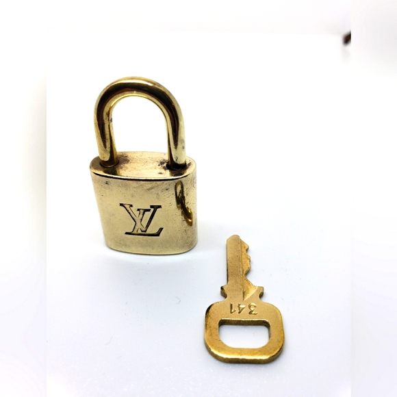 Louis Vuitton Handbags - 341 Authentic Louis Vuitton Lock And Key Set